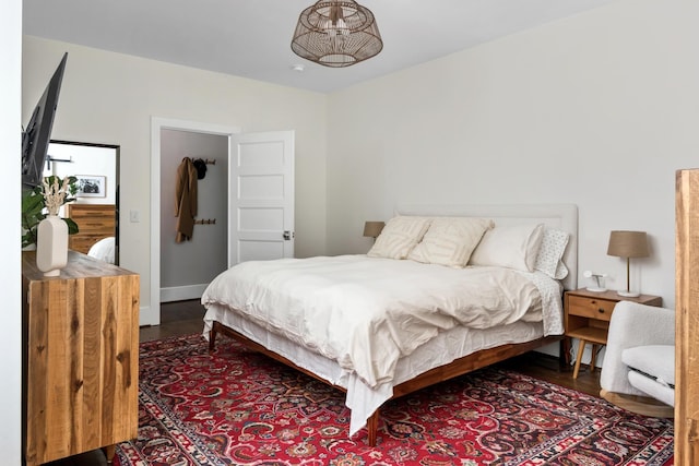 bedroom featuring hardwood / wood-style flooring