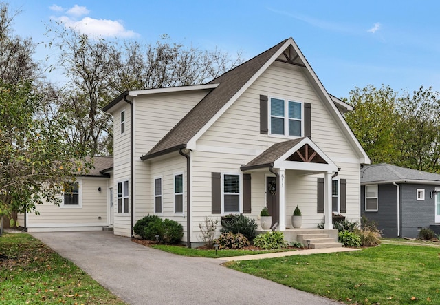 view of front of home with a front lawn