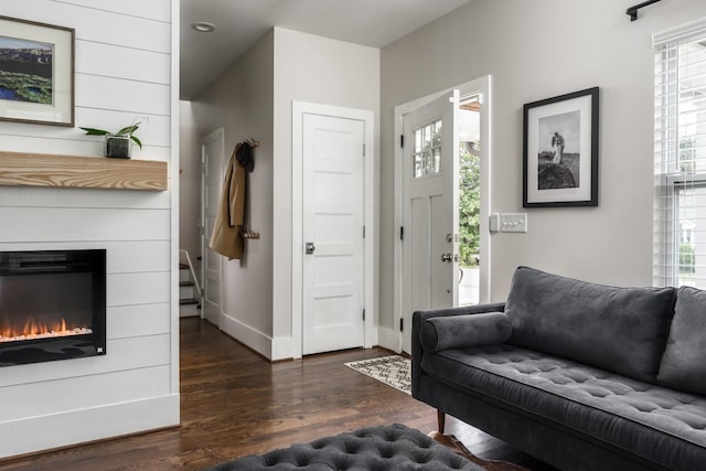 living room featuring dark hardwood / wood-style flooring