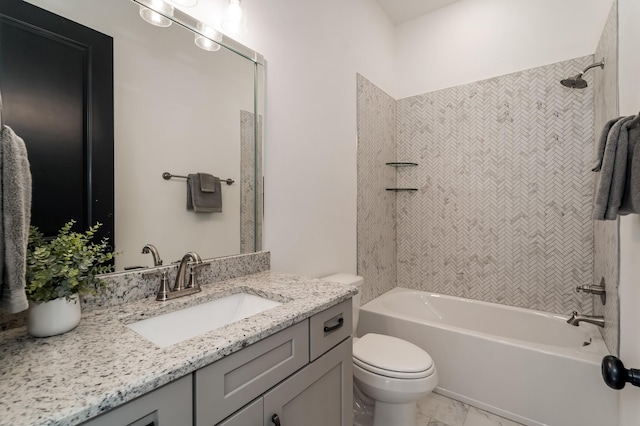 full bathroom featuring tiled shower / bath combo, toilet, and vanity