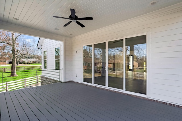 wooden deck with ceiling fan