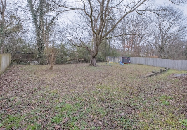 view of yard with a playground