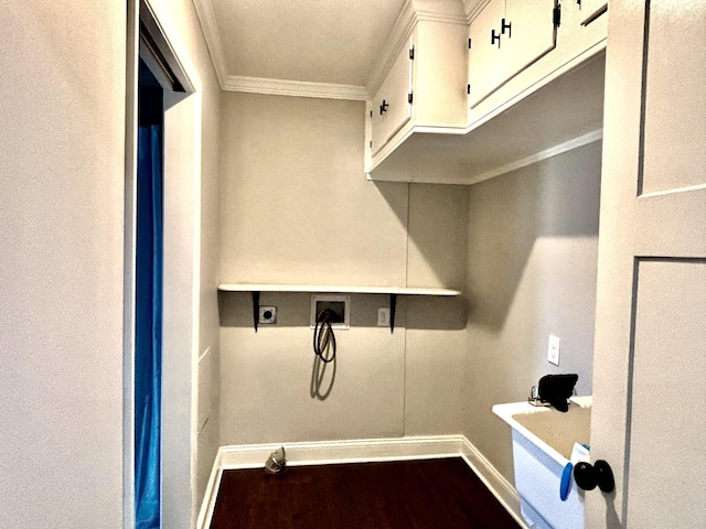 washroom with hookup for a washing machine, cabinets, crown molding, electric dryer hookup, and hardwood / wood-style flooring