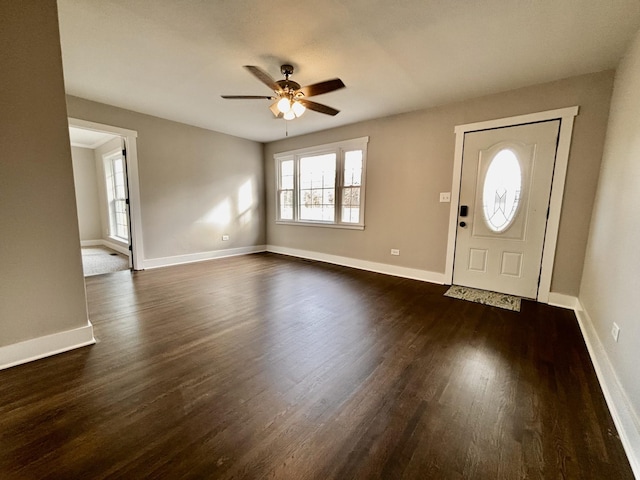 foyer entrance featuring ceiling fan and dark hardwood / wood-style floors