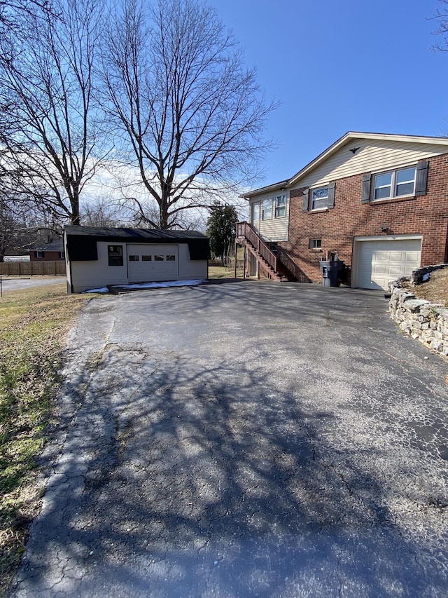 view of side of property with a garage