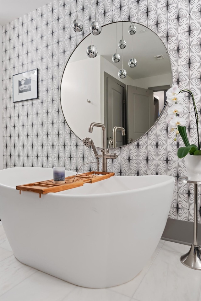 bathroom featuring sink and a bathing tub