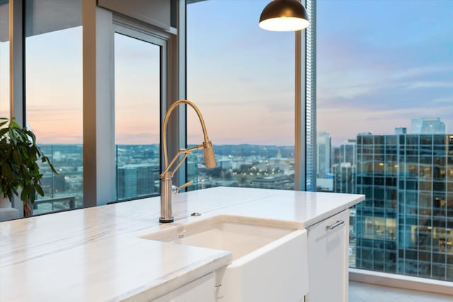 kitchen with sink and white cabinets