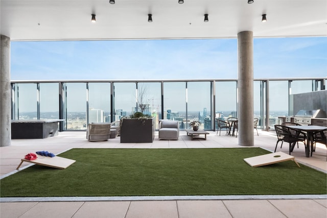 view of patio / terrace featuring area for grilling and exterior kitchen