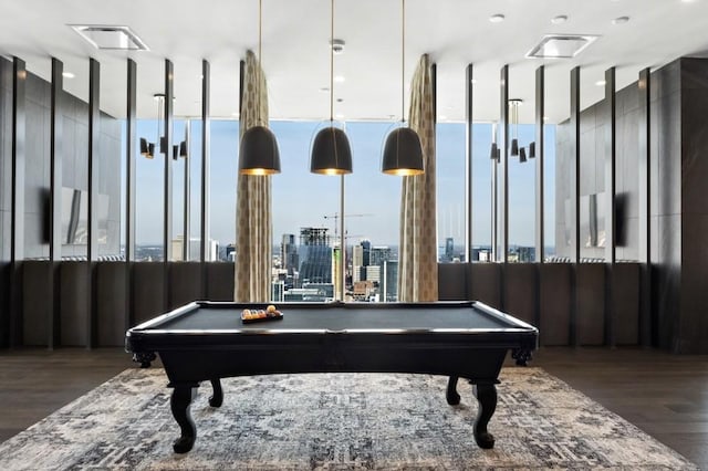 playroom with pool table and dark hardwood / wood-style floors