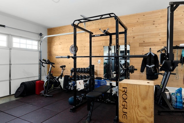 exercise room with wooden walls