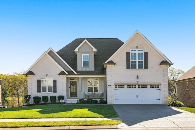 view of front facade featuring a garage and a front lawn