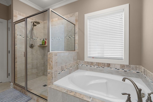 bathroom featuring crown molding and plus walk in shower