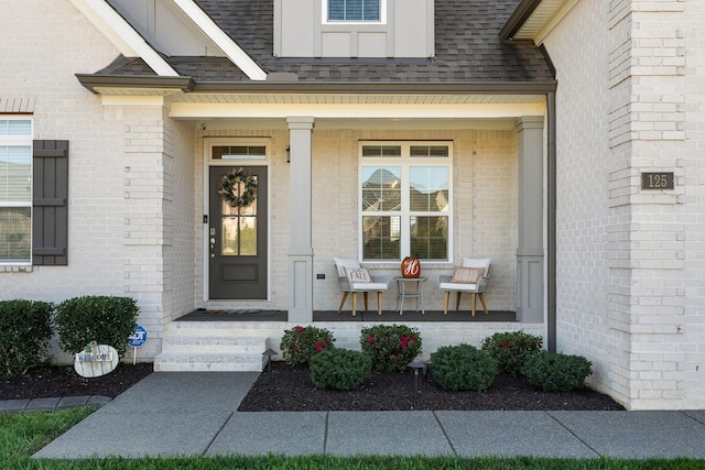 entrance to property with covered porch