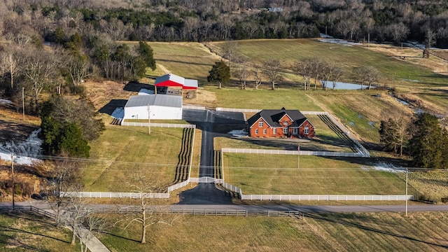 birds eye view of property featuring a rural view