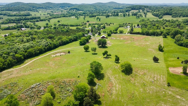 bird's eye view featuring a mountain view and a rural view