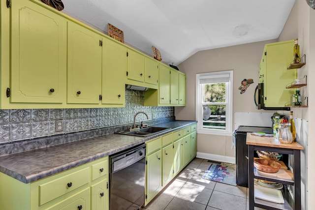 kitchen featuring lofted ceiling, dishwasher, stove, sink, and light tile patterned flooring