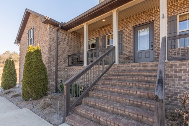 doorway to property with a porch