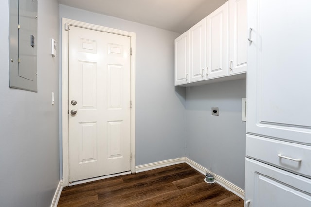 laundry area with electric panel, hookup for an electric dryer, dark hardwood / wood-style floors, and cabinets