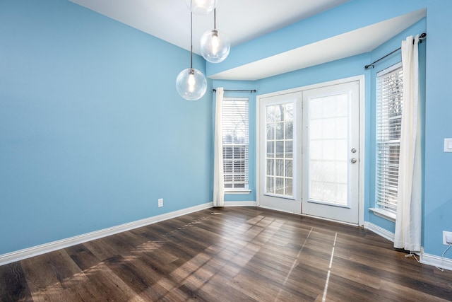 unfurnished room with dark hardwood / wood-style floors