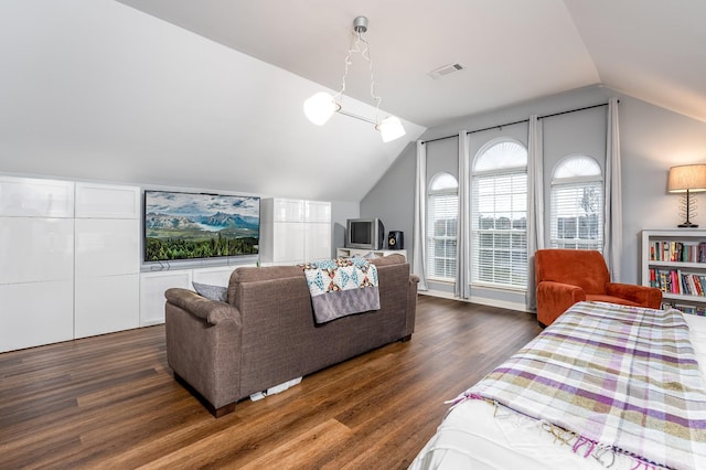 living room featuring dark hardwood / wood-style floors and lofted ceiling