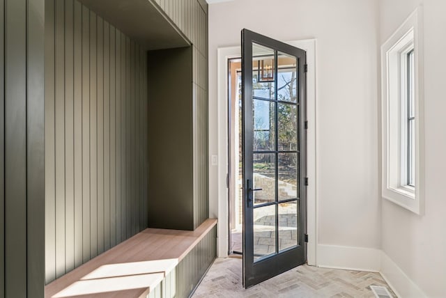 mudroom featuring light parquet floors