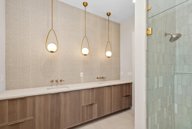 bathroom featuring vanity and a shower