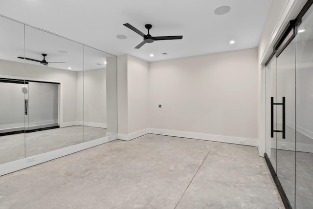 interior space featuring two closets and ceiling fan