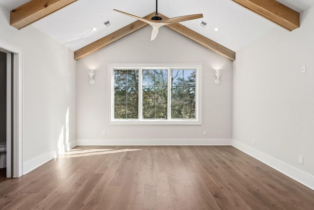 unfurnished living room with hardwood / wood-style floors, lofted ceiling with beams, and ceiling fan