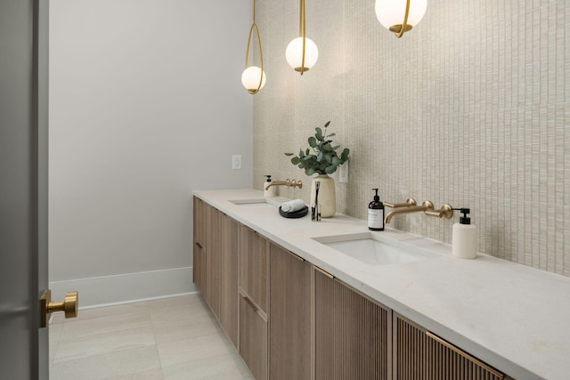 bathroom with vanity, tile patterned floors, and decorative backsplash