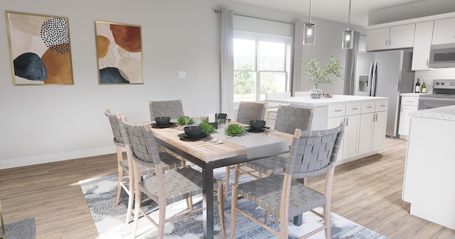 dining area featuring light hardwood / wood-style flooring