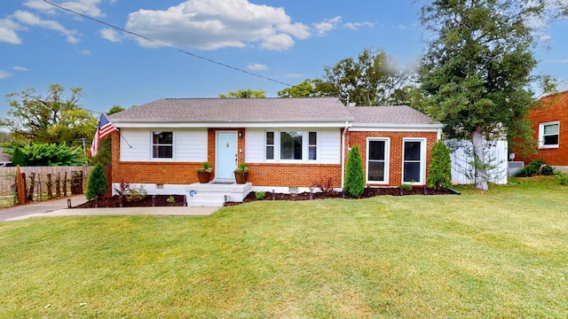 view of front of home with a front lawn