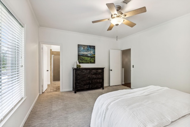 carpeted bedroom featuring ceiling fan and crown molding