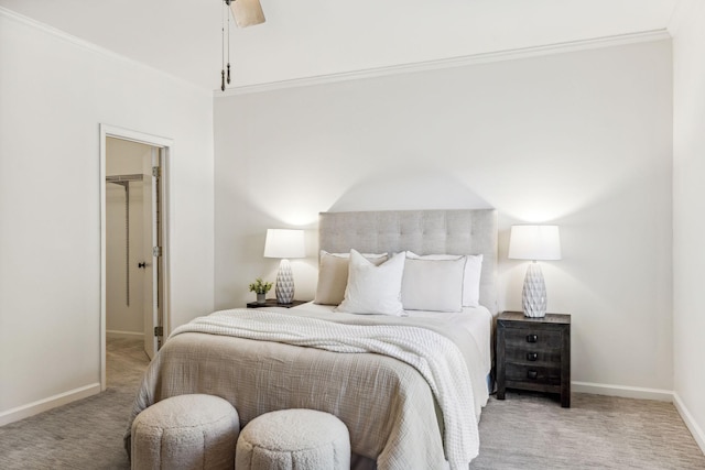 bedroom featuring ceiling fan, ornamental molding, and light carpet