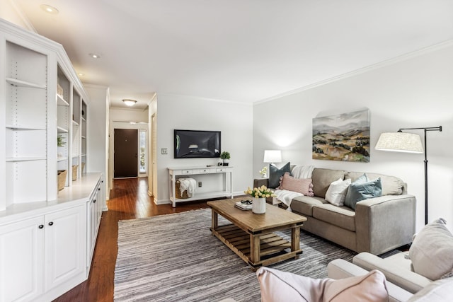 living room with crown molding and dark hardwood / wood-style floors