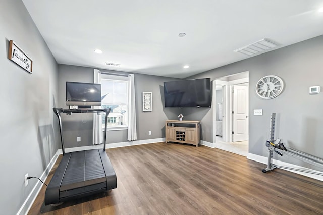 exercise area featuring wood-type flooring