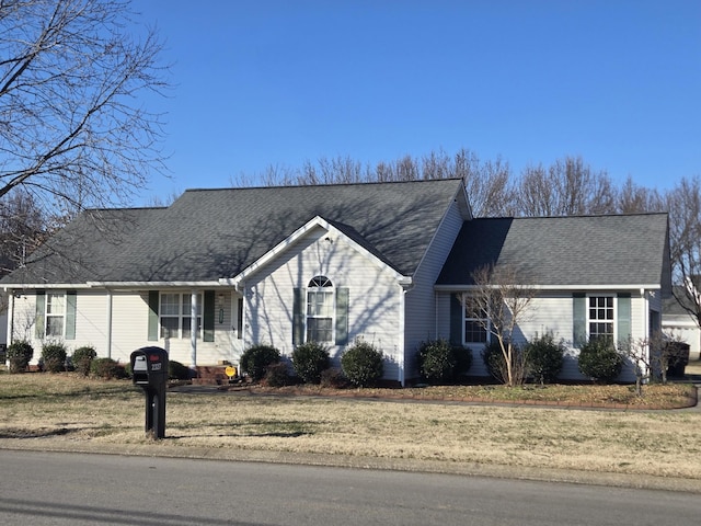 view of front of home with a front lawn