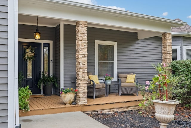 entrance to property featuring a porch