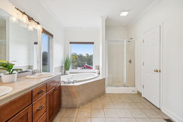 bathroom featuring independent shower and bath, vanity, tile patterned floors, and crown molding