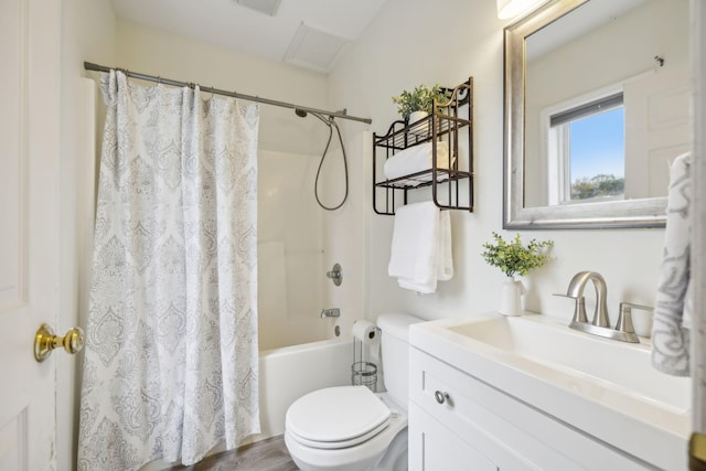 full bathroom featuring hardwood / wood-style flooring, toilet, vanity, and shower / tub combo with curtain