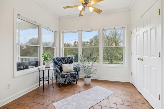 sunroom with ceiling fan