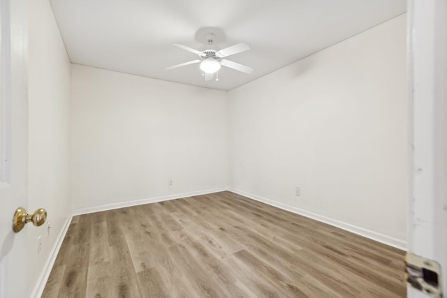 unfurnished room with ceiling fan and light hardwood / wood-style flooring