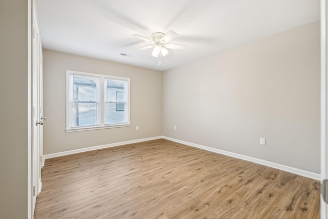 unfurnished room featuring ceiling fan and light hardwood / wood-style flooring