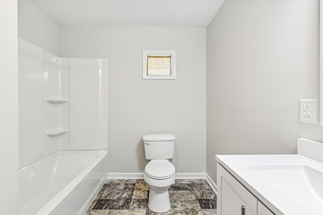 full bathroom featuring toilet, vanity, and bathing tub / shower combination