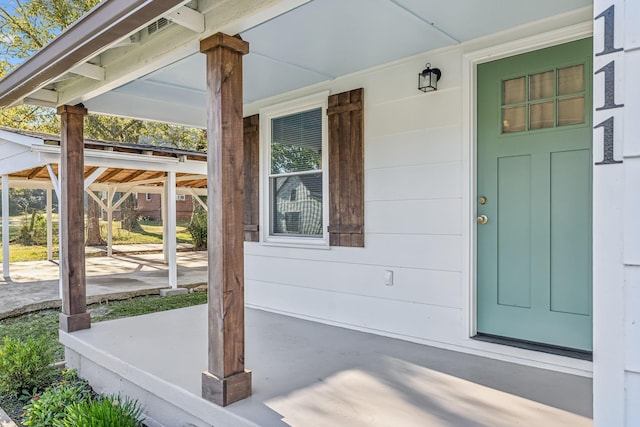 entrance to property with a porch