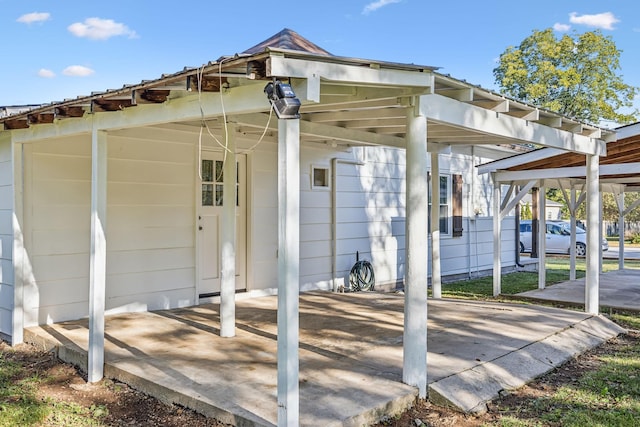 view of patio featuring a carport