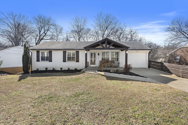 ranch-style house featuring a garage, a front yard, and covered porch