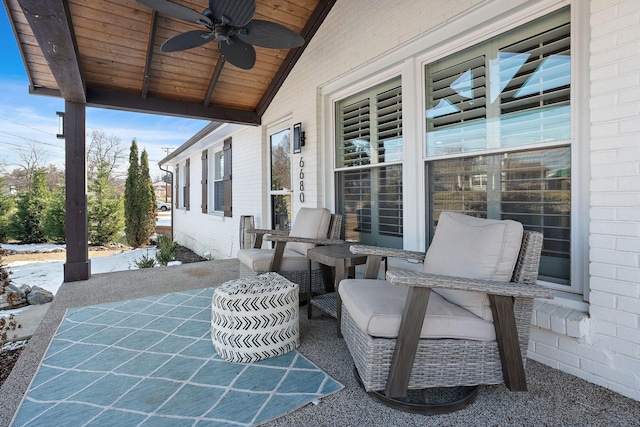 view of patio / terrace featuring ceiling fan