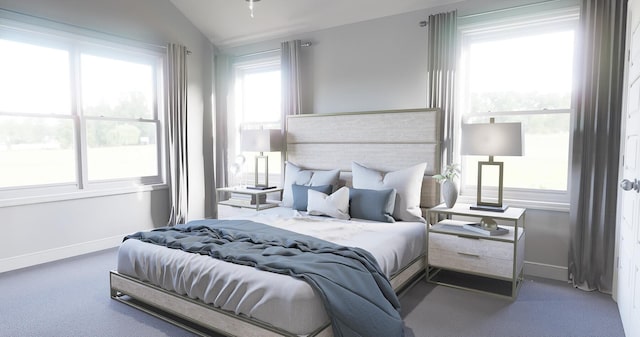 carpeted bedroom featuring lofted ceiling