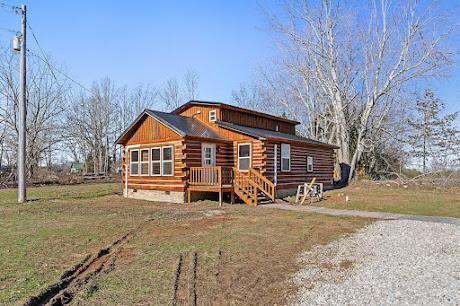 view of log cabin