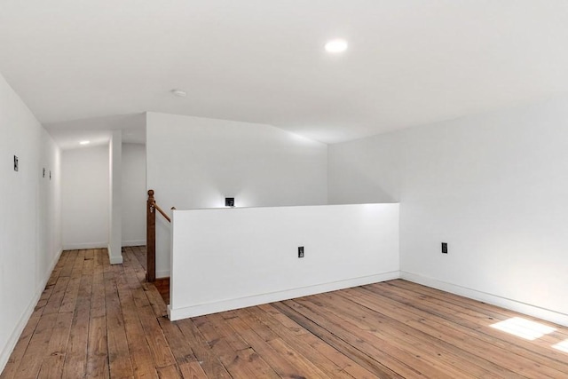 spare room featuring light hardwood / wood-style floors